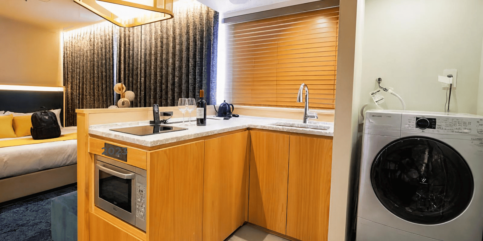 Hotel room with washer and dryer